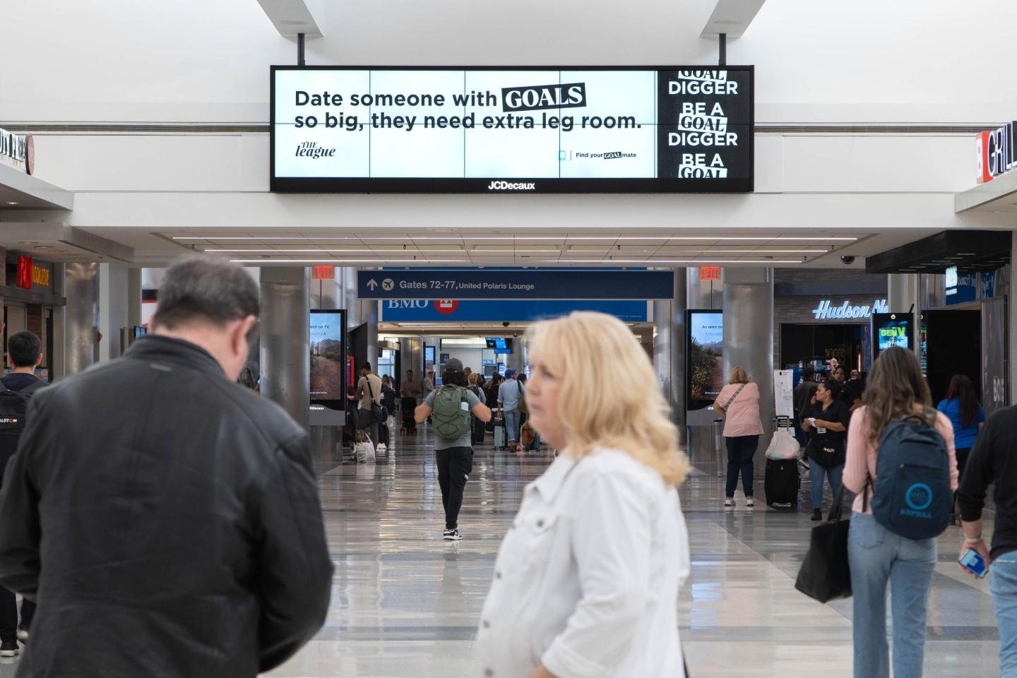 Digital screen at LAX: Date someone with goals so big, they need extra leg room.