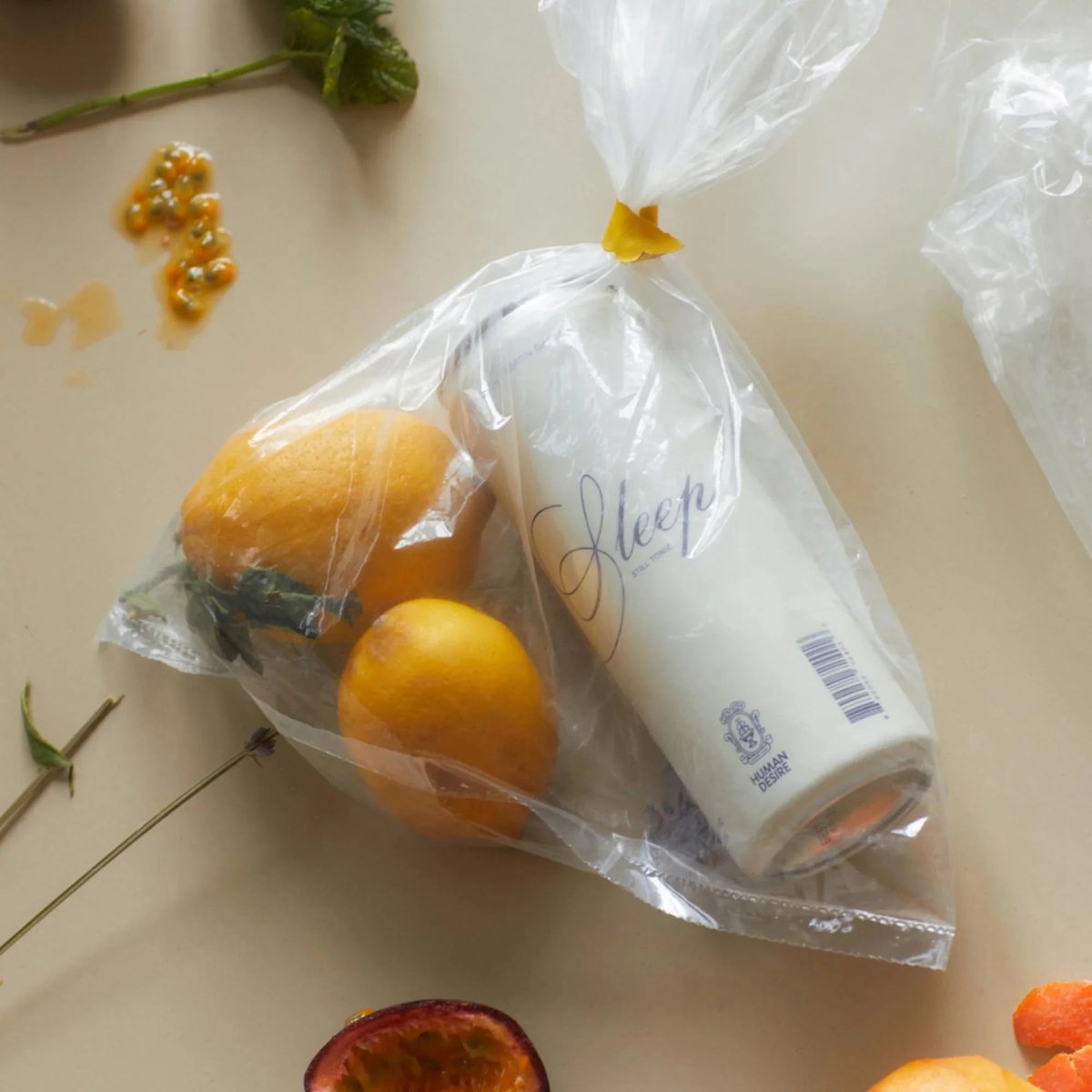 Sleep can in a tied plastic bag with lemons