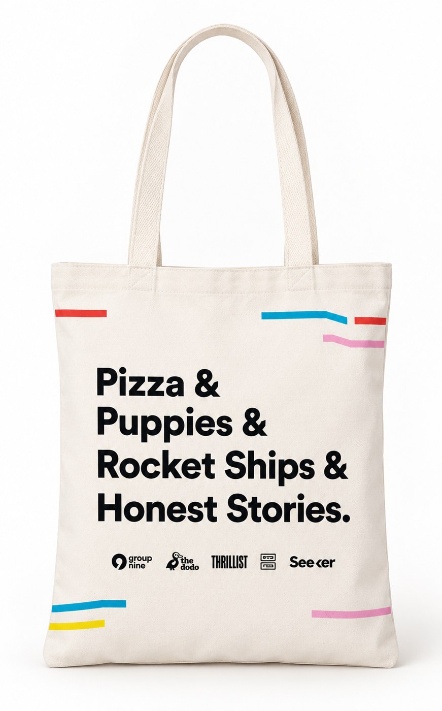 Group Nine tote bag reading Pizza and Puppies and Rocket Ships and Honest Stories