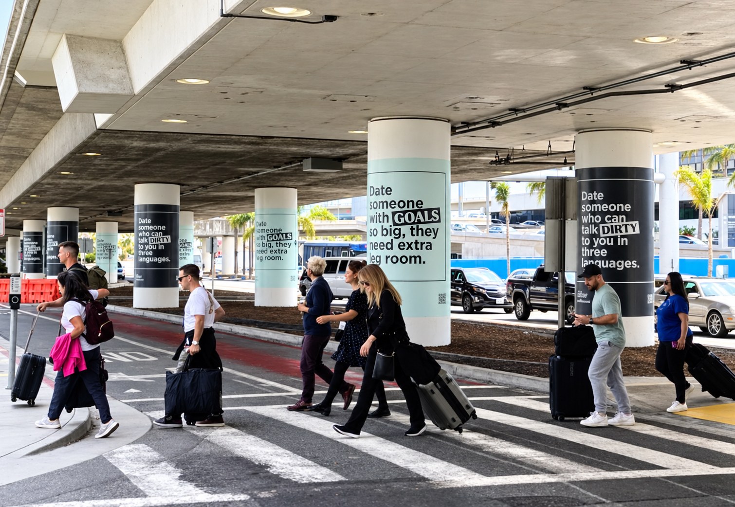 LAX curbside column wraps: Date someone who can talk dirty to you in three languages, and Date someone with goals so big, they need extra leg room.